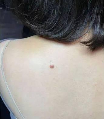 后背有痣的女人